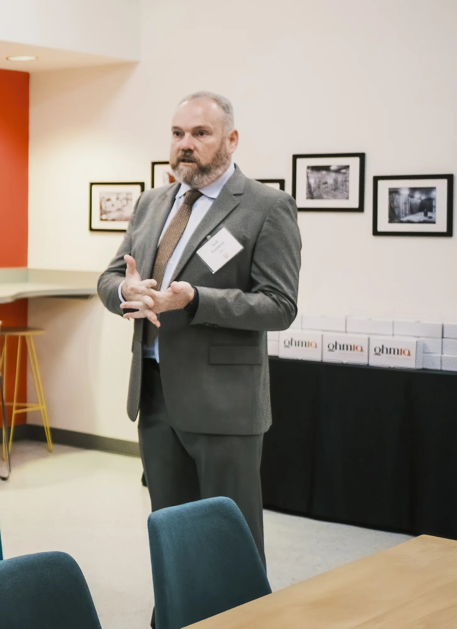 Neil Gannon speaking to guests at the OhmIQ facility opening